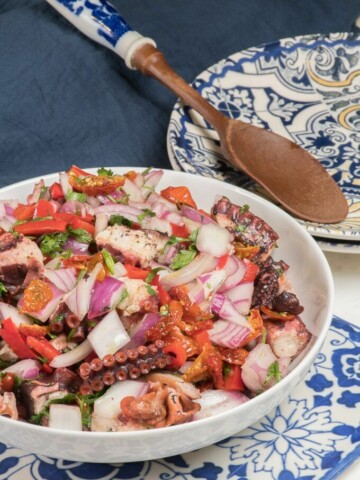 a bowl of portuguese octopus salad/