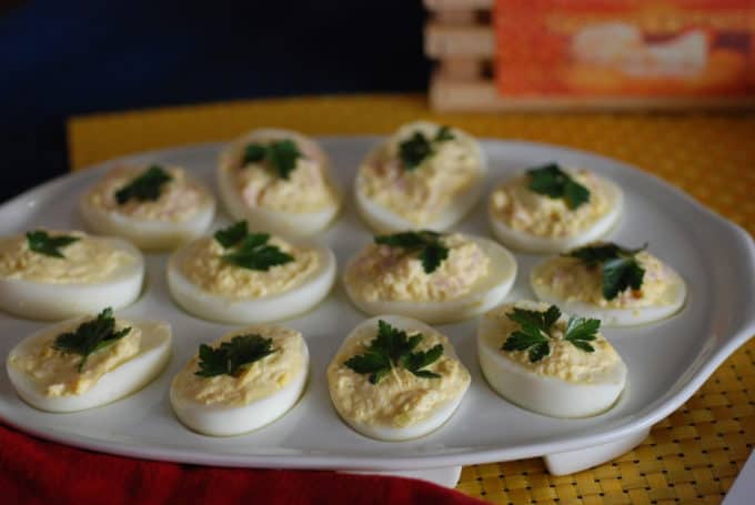 a plate full of Romanian deviled eggs