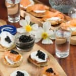 Russin Blinis topped with sour cream, caviar and salmon