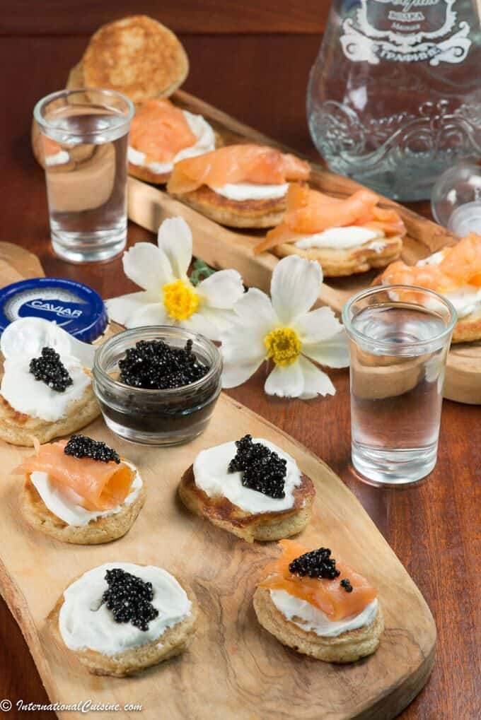 Russin Blinis topped with sour cream, caviar and salmon