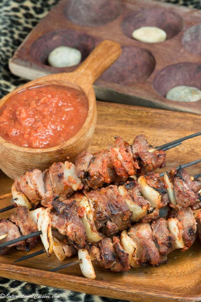 Rwandan goat brochettes with tomato sauce