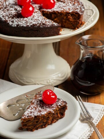 Caribbean Black cake with a cherry on top