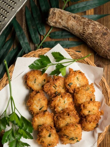 A plate full of fried fritters made from Malanga