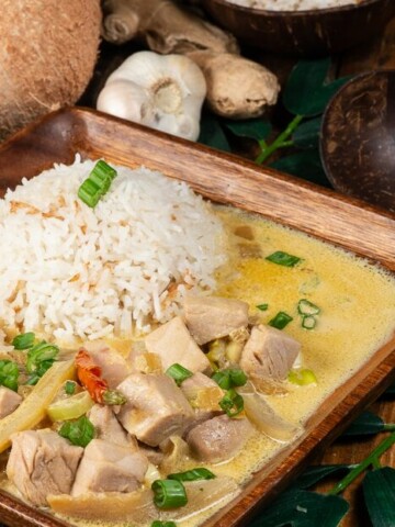A plateful of tuna coconut curry served with coconut rice