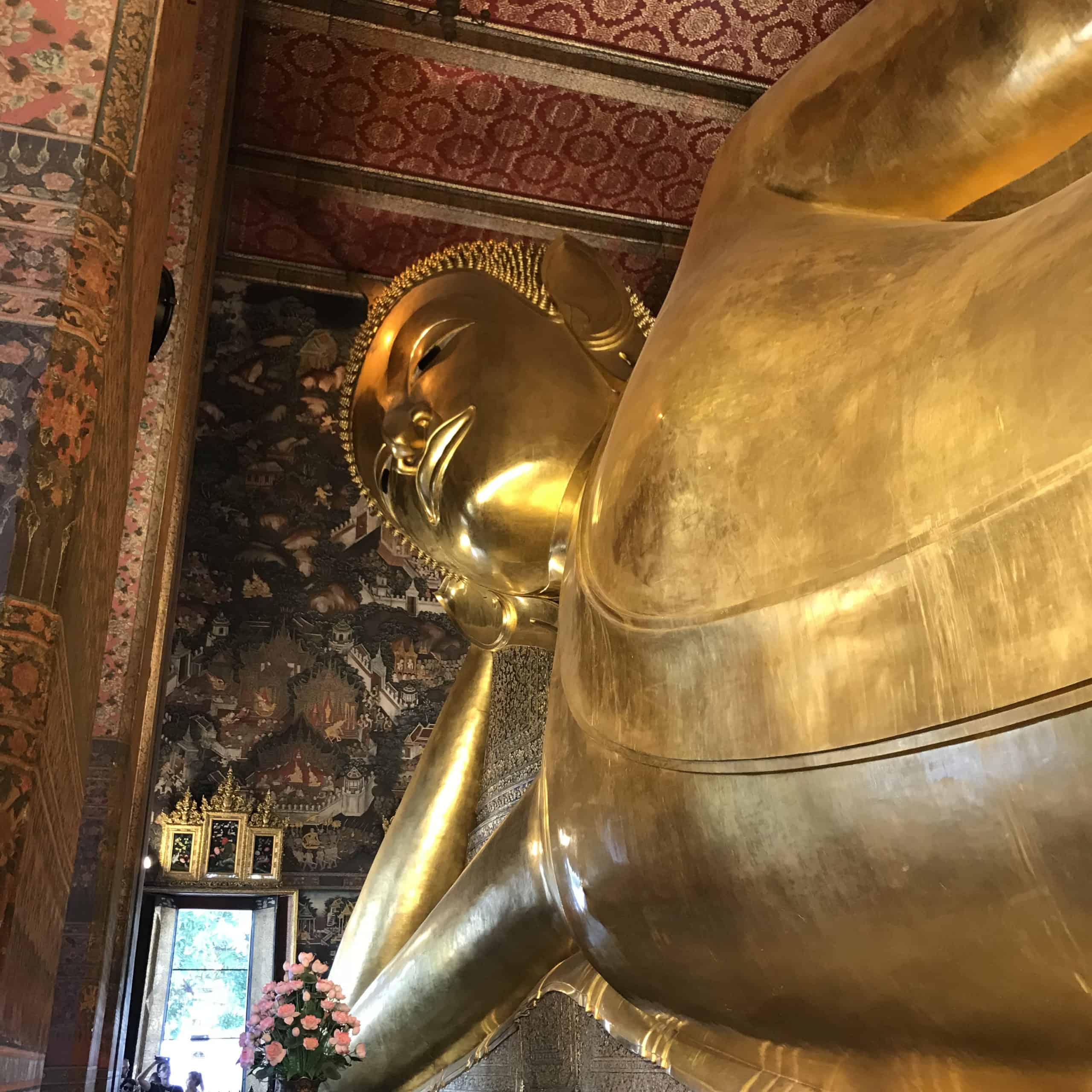 a picture of the giant reclining gold buddha in Bangkok Thailand Wat Pho