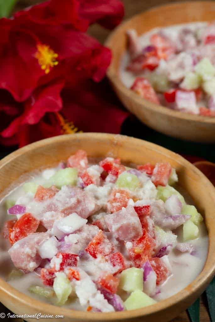 A bowl full of Ota Ika a Tongan Raw Fish salad made with coconut milk.