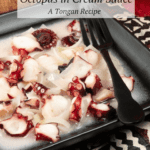 A dish of Octopus and onions in a coconut cream sauce