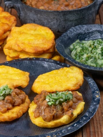 a plateful of Trinidad doubles with cilantro chutney