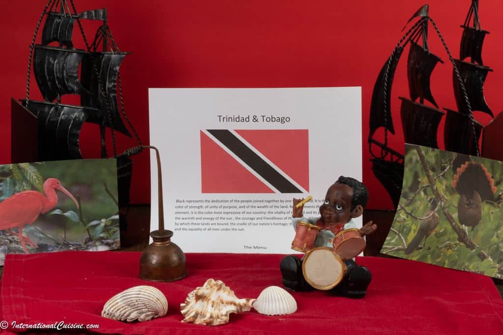 Items representing Trinidad and Tobago, their flag, ships, shells, a little drummer.