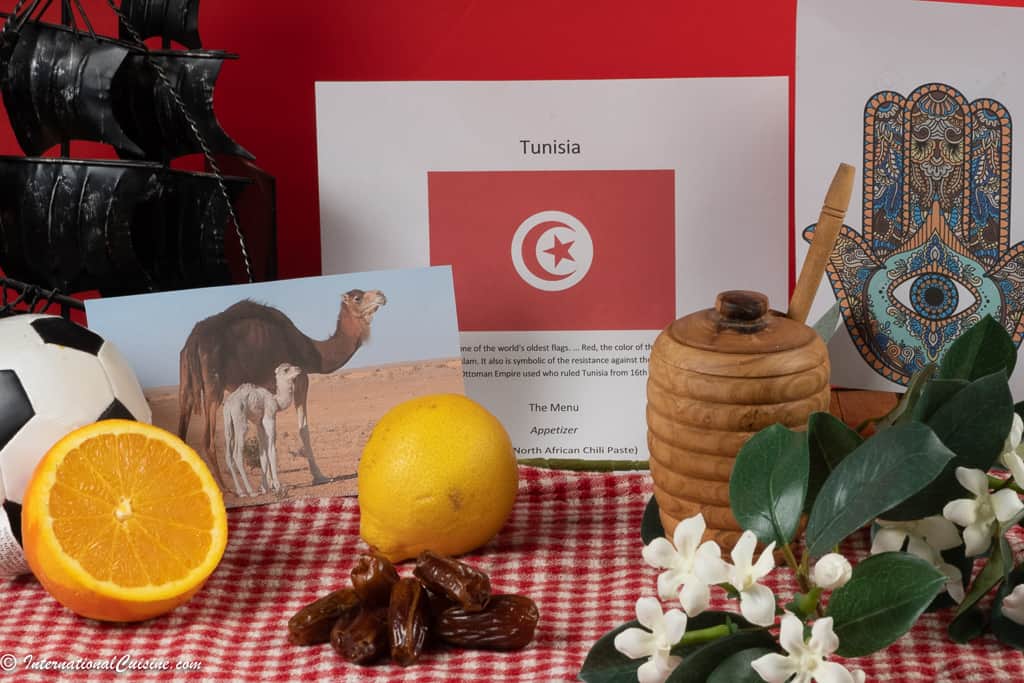 Symbols of Tunisa, the flag, citrus, dates, jasmine, camels