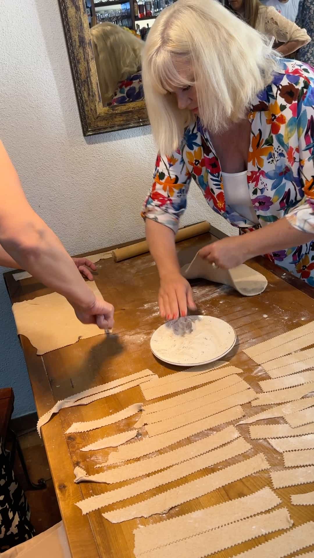 making stratza noodles using a pastry cutter.