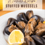 A plateful of stuffed mussels with lemon