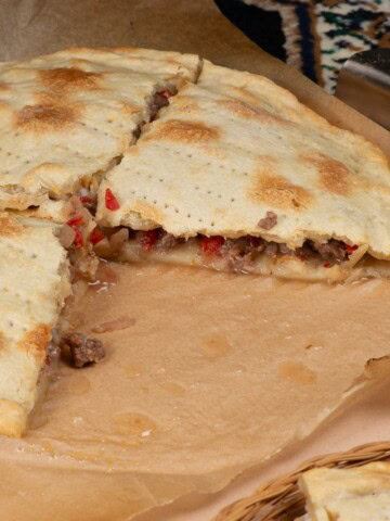 Slices of Ichlekli- a thin meat pie.