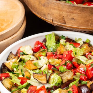 A colorful bowl of Turkmenistan Fried Eggplant Salad