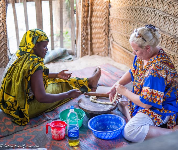 Darlene making bread in the home of Mr, Okala in Zanzibar, Tanzania
