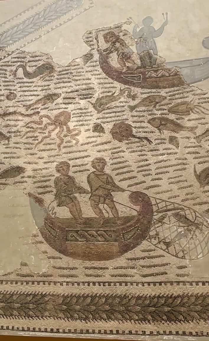 Roman mosaics depicting fisherman casting a net from a boat at the Bardo Museum in Tunis.