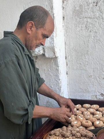 vendor preparing traditional sweets in the Medina of Tunis, Tunisia