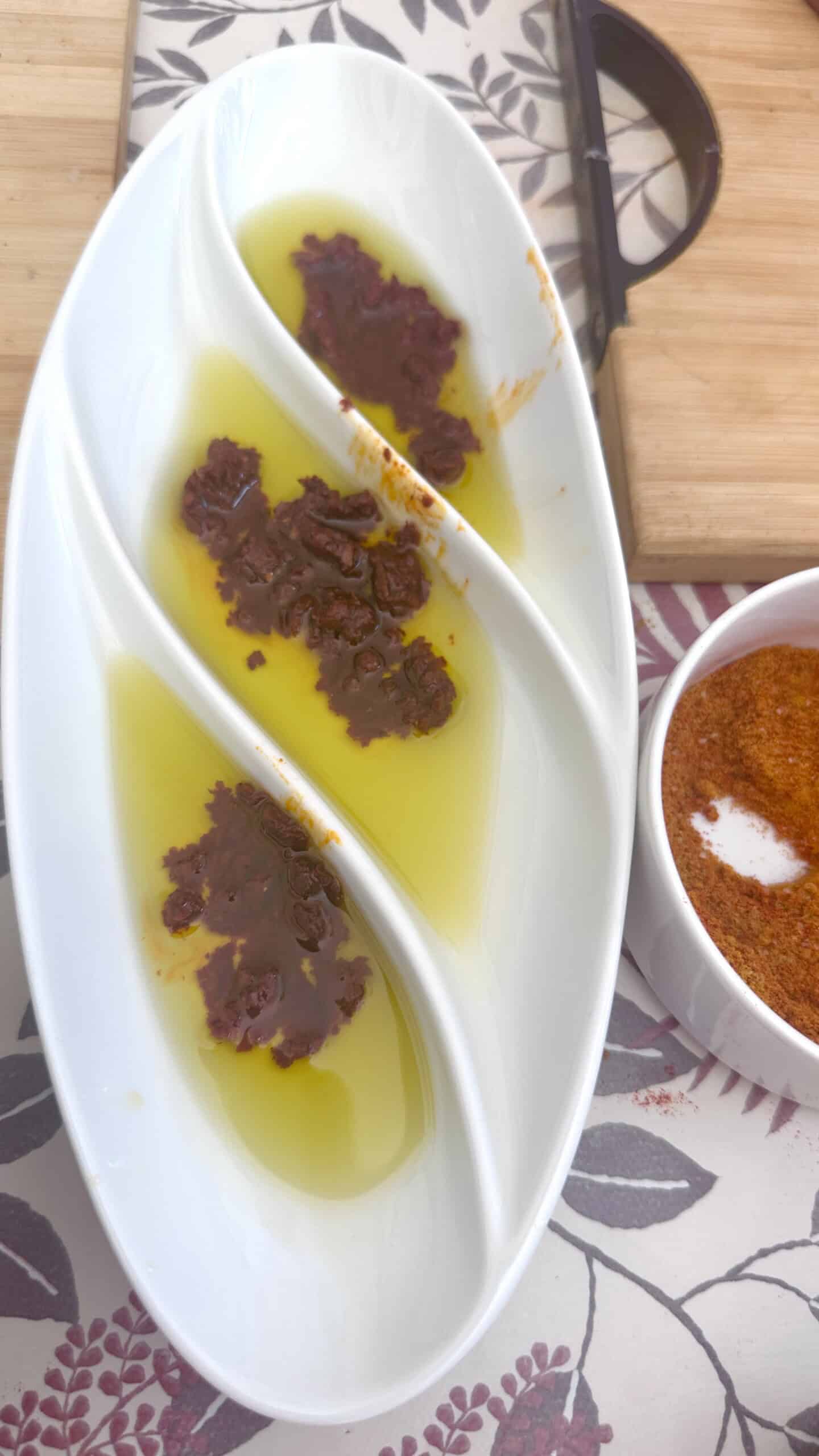 Jiji's' homemade harissa served with olive oil from her family's olive grove.