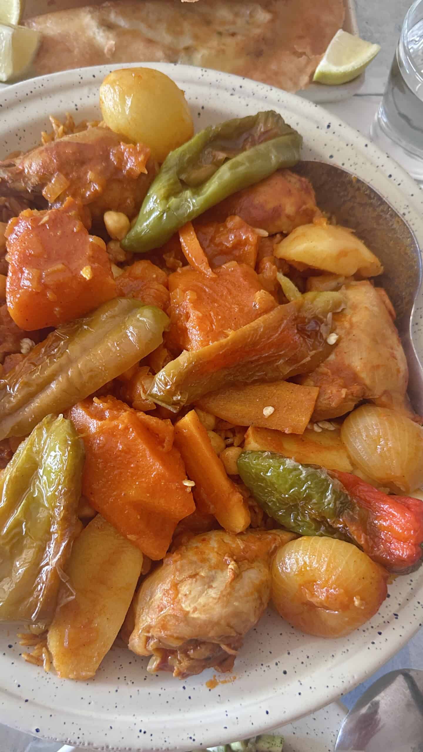 Tunisian dwindle with chicken, potatoes, chickpeas, vegetables and tabil stuffed peppers.